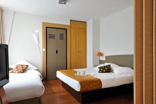 Imagen de la habitación del Apartahotel Adagio Nantes Centre. Foto 14