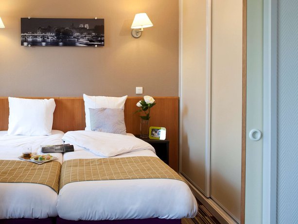 Imagen de la habitación del Apartahotel Adagio Paris Buttes Chaumont. Foto 3