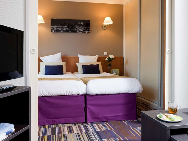 Imagen de la habitación del Apartahotel Adagio Paris Buttes Chaumont. Foto 11