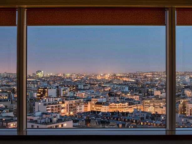 Imagen de la habitación del Apartahotel Adagio Paris Centre Tour Eiffel. Foto 2