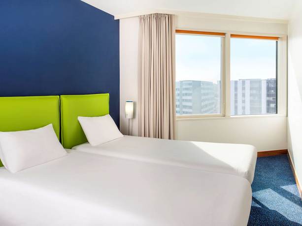 Imagen de la habitación del Apartahotel Adagio Paris Centre Tour Eiffel. Foto 6