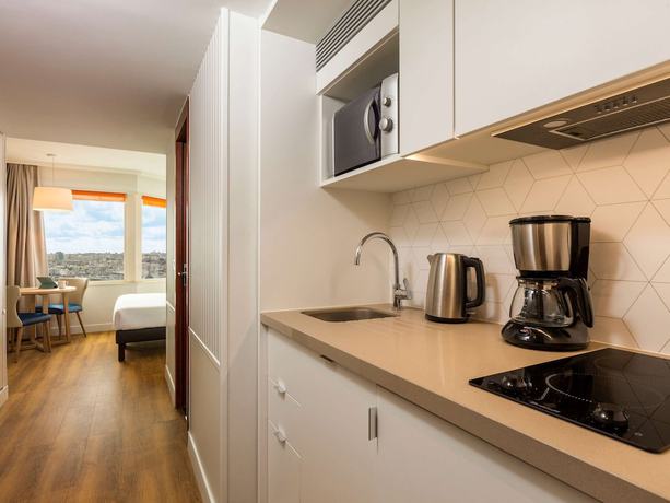 Imagen de la habitación del Apartahotel Adagio Paris Centre Tour Eiffel. Foto 7