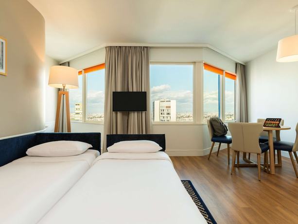 Imagen de la habitación del Apartahotel Adagio Paris Centre Tour Eiffel. Foto 18