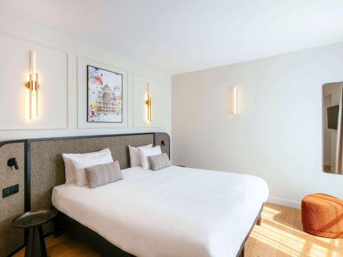 Imagen de la habitación del Apartahotel Adagio Paris Opera. Foto 19