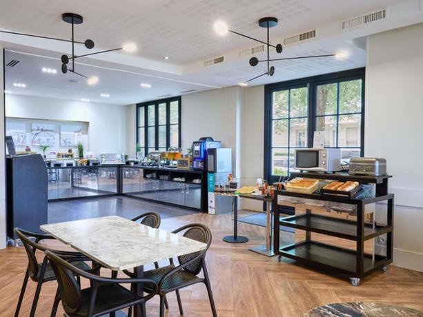 Imagen del bar/restaurante del Apartahotel Adagio Serris - Val d'Europe. Foto 3