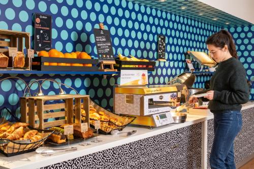 Imagen del bar/restaurante del Apartahotel Adagio Val d'Europe près de Disneyland Paris. Foto 12