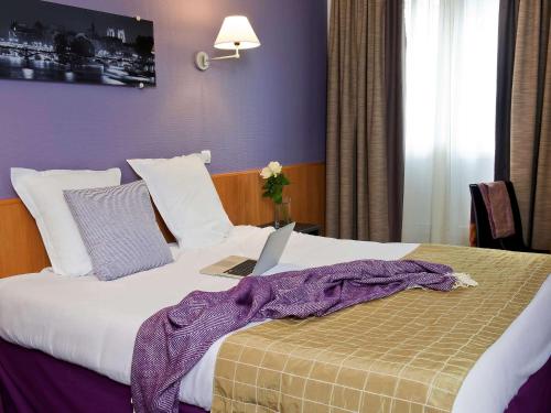 Imagen de la habitación del Apartahotel Adagio la Defense-Le Parc. Foto 14