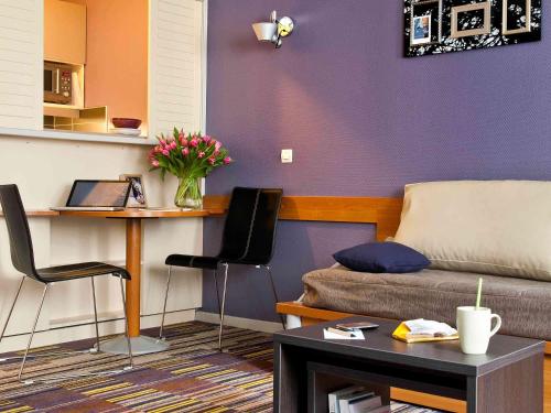 Imagen de la habitación del Apartahotel Adagio la Defense-Le Parc. Foto 19