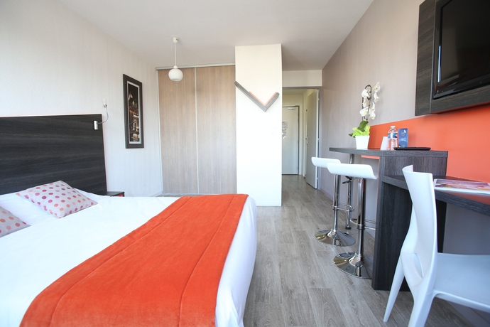 Imagen de la habitación del Apartahotel Adonis Paris Sud. Foto 8