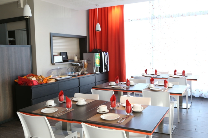 Imagen del bar/restaurante del Apartahotel Adonis Paris Sud. Foto 3