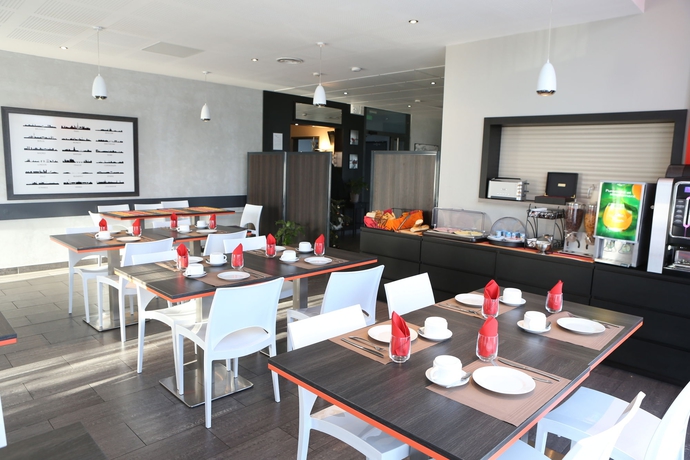 Imagen del bar/restaurante del Apartahotel Adonis Paris Sud. Foto 5