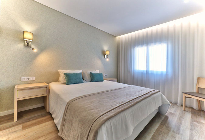 Imagen de la habitación del Apartahotel Agua Hotels Vila Branca. Foto 6