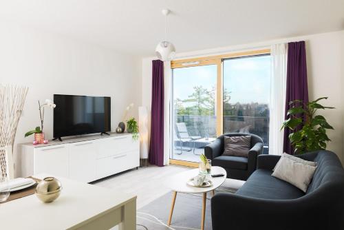 Imagen de la habitación del Apartahotel Aparthotel Adagio Bâle Mulhouse Aeroport. Foto 12