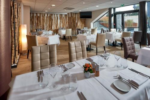 Imagen del bar/restaurante del Apartahotel Aparthotel Adagio Bâle Mulhouse Aeroport. Foto 10