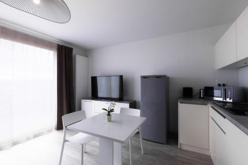 Imagen de la habitación del Apartahotel Aparthotel Adagio Bâle Mulhouse Aeroport. Foto 20