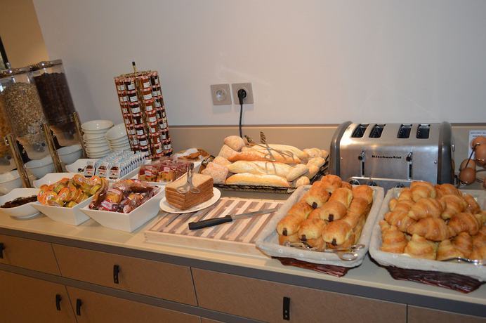 Imagen del bar/restaurante del Apartahotel Aparthotel Adagio Lyon Patio Confluence. Foto 3