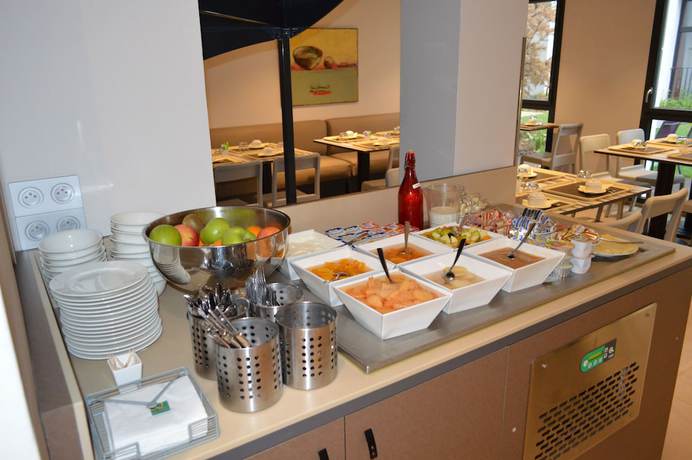 Imagen del bar/restaurante del Apartahotel Aparthotel Adagio Lyon Patio Confluence. Foto 4