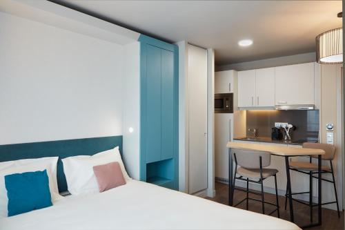 Imagen de la habitación del Apartahotel Aparthotel Adagio Paris Suresnes Longchamp. Foto 6