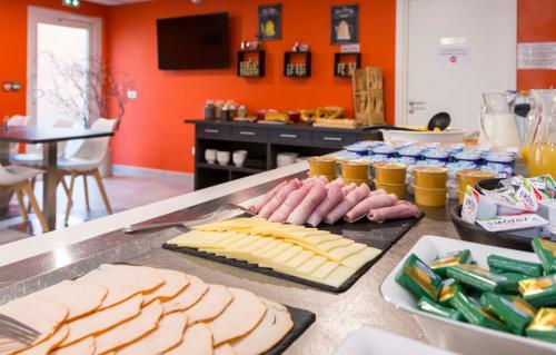 Imagen del bar/restaurante del Apartahotel Appart'h&ocirc;tel Odalys City - Colmar Centre. Foto 3