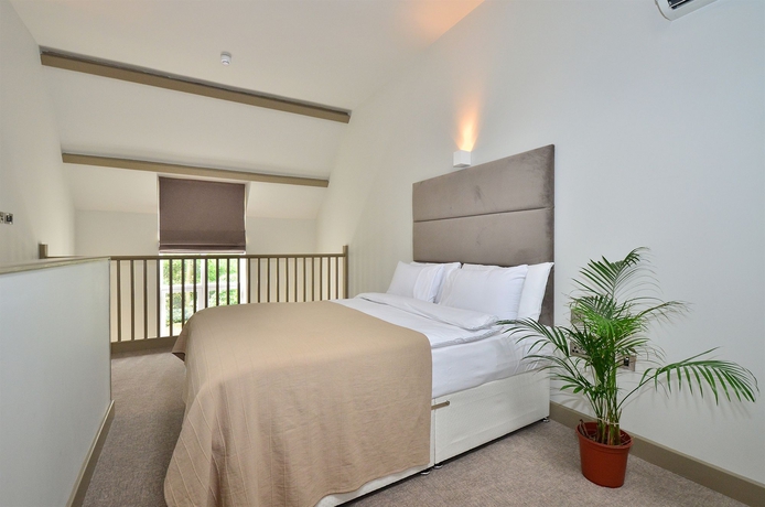 Imagen de la habitación del Apartahotel Arch. Foto 12