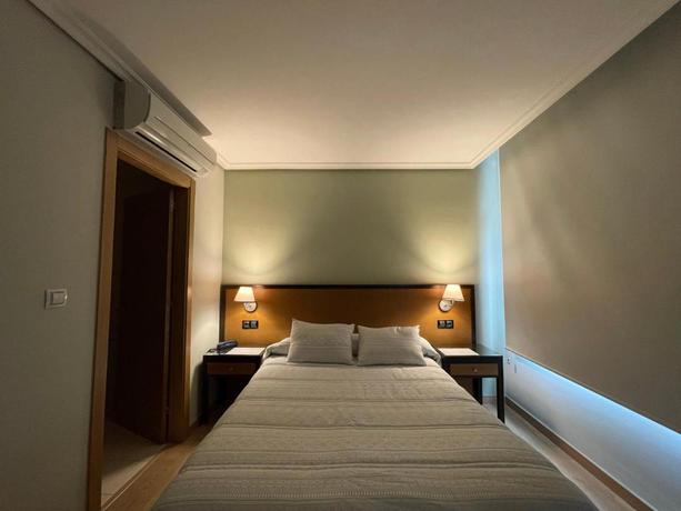 Imagen de la habitación del Apartahotel Arenteiro. Foto 7