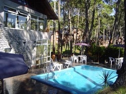 Imagen de la piscina del Apartahotel Ayres De Caril&oacute;. Foto 5