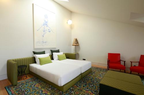 Imagen de la habitación del Apartahotel Cais Urban Lodge. Foto 14