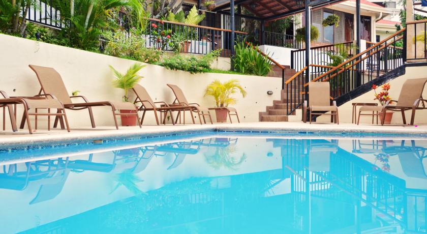 Imagen de la piscina del Apartahotel Casa Reflejos. Foto 9