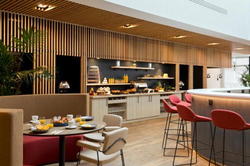 Imagen del bar/restaurante del Apartahotel Citadines Eurometropole Strasbourg. Foto 3