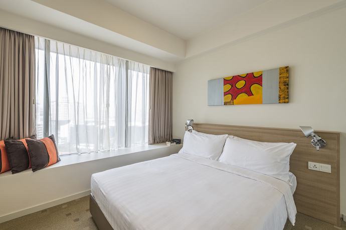 Imagen de la habitación del Apartahotel Citadines Mount Sophia Singapore. Foto 13