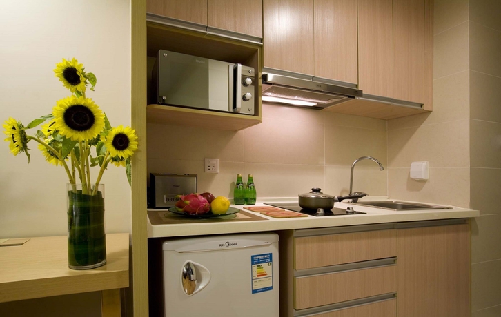 Imagen de la habitación del Apartahotel Citadines Xingqing Palace Xi'an. Foto 9