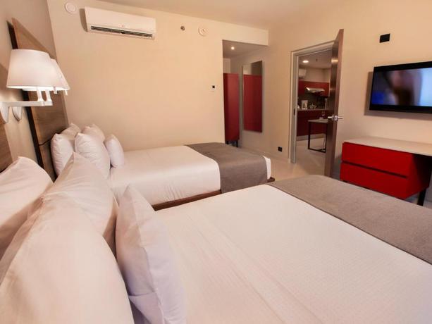 Imagen de la habitación del Apartahotel City Express Suites Cabo San Lucas. Foto 3