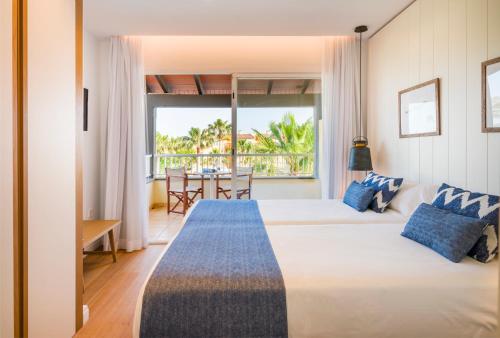 Imagen de la habitación del Apartahotel Club Del Sol Resort and Spa. Foto 19