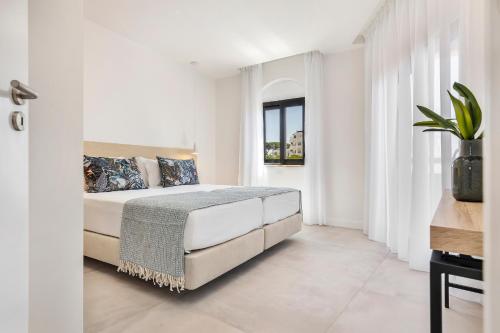 Imagen de la habitación del Apartahotel Clube Maria Luisa. Foto 16