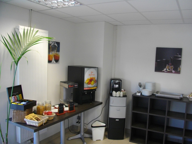 Imagen del bar/restaurante del Apartahotel Comfort Aparthotel Besancon Hauts du Chazal. Foto 2