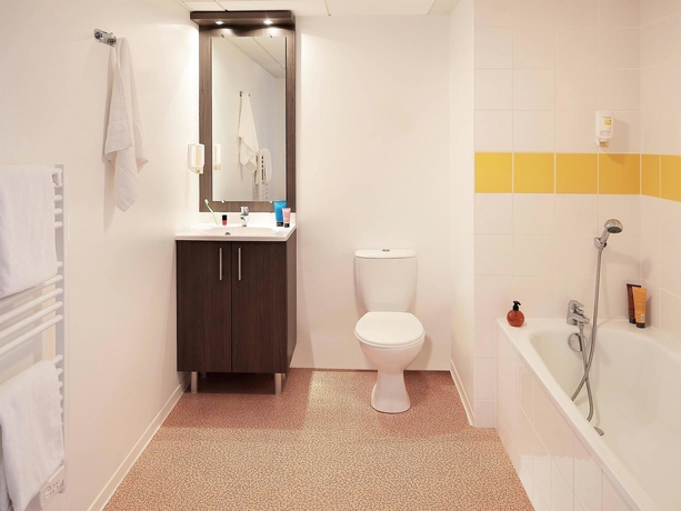 Imagen de la habitación del Apartahotel Comfort Aparthotel Nîmes Centre. Foto 12