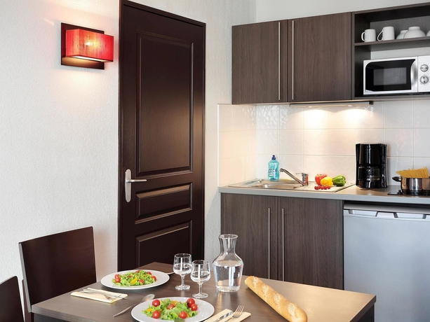 Imagen de la habitación del Apartahotel Comfort Aparthotel Nîmes Centre. Foto 14