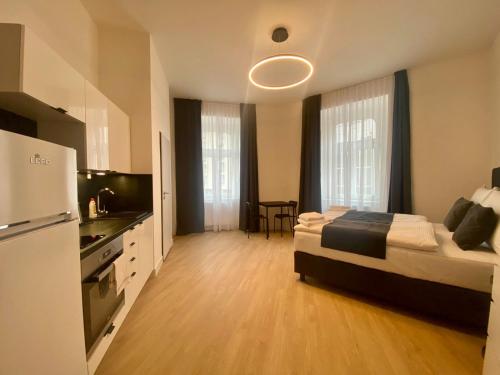 Imagen de la habitación del Apartahotel Figaro Suites. Foto 2