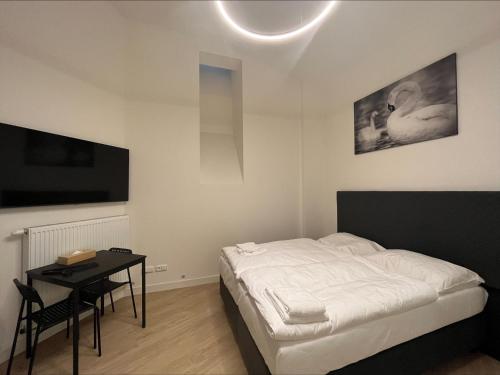 Imagen de la habitación del Apartahotel Figaro Suites. Foto 3