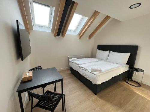 Imagen de la habitación del Apartahotel Figaro Suites. Foto 4