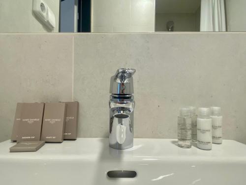 Imagen de la habitación del Apartahotel Figaro Suites. Foto 6