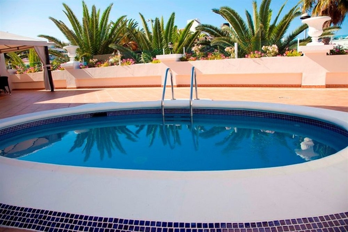 Imagen de la piscina del Apartahotel Flamingo Suites Boutique Hotel. Foto 16