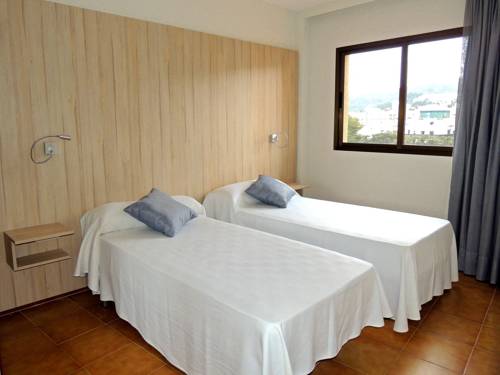 Imagen de la habitación del Apartahotel GHT Tossa Park. Foto 9