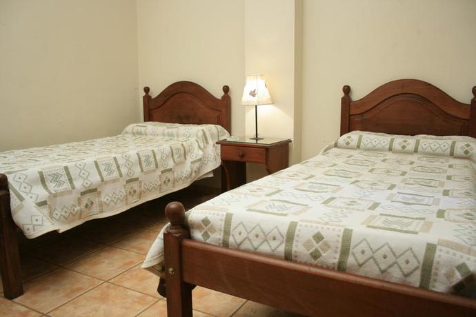 Imagen de la habitación del Apartahotel HOTEL Y APART-HOTEL COL&Oacute;N. Foto 2