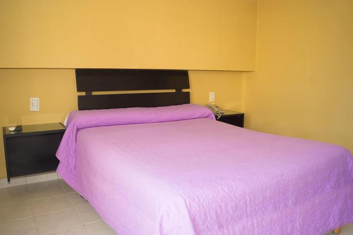 Imagen de la habitación del Apartahotel HOTEL Y APART-HOTEL COL&Oacute;N. Foto 4