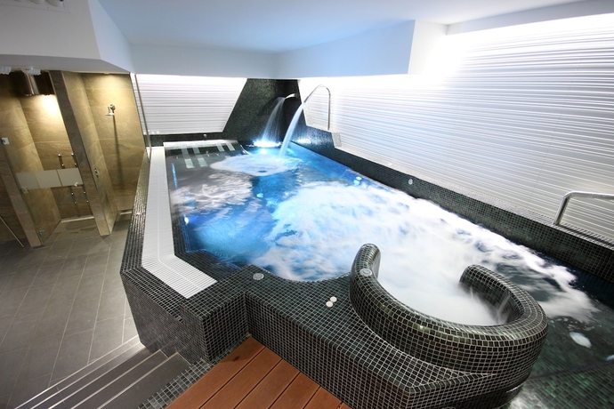 Imagen de la piscina del Apartahotel Hotel Spa Nanin Playa. Foto 17