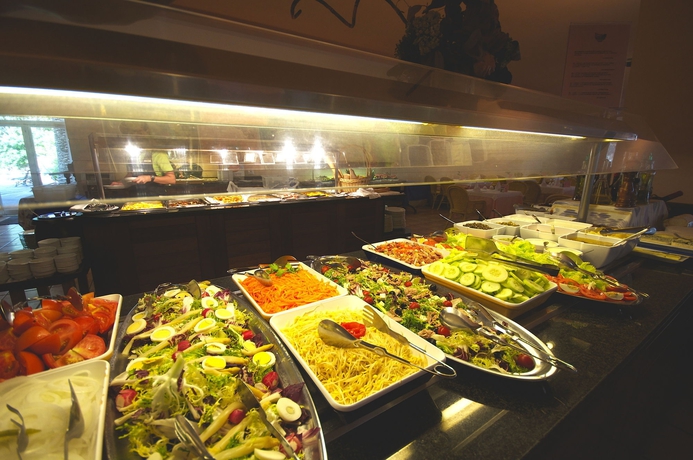 Imagen del bar/restaurante del Apartahotel Houm Plaza Son Rigo. Foto 2