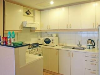 Imagen de la habitación del Apartahotel Hua Wei. Foto 3
