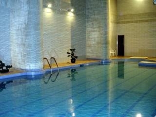 Imagen de la piscina del Apartahotel Hua Wei. Foto 7