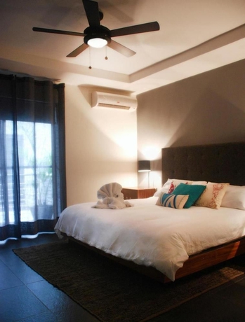 Imagen de la habitación del Apartahotel Koox La Mar Condhotel. Foto 5